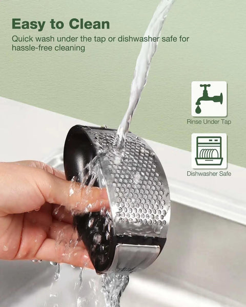 Garlic Press Rocker Stainless Steel Crusher Mincer And Chopper rinsed under tap for effortless garlic crushing and easy cleaning.