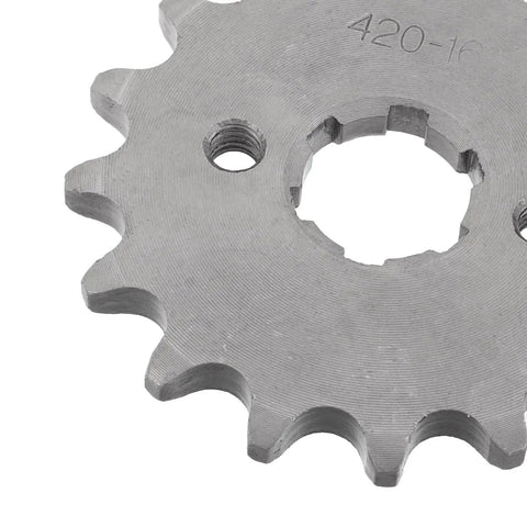 Close-up of beefed up alloy steel motorcycle sprocket chain gear with screw and retainer plate, small inner diameter.