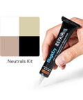 Hand holding Porcelain Tile Repair Kit With Color Matching Filler tube, mix and match neutral tones for ceramic acrylic surfaces.