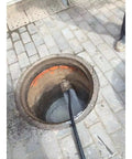 Industrial Heavy Duty Drain Cleaner With 120m Hose for Sewer Cleaning Pipe Cleaning System in action, clearing pipelines