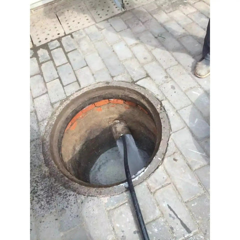 Industrial Heavy Duty Drain Cleaner With 120m Hose for Sewer Cleaning Pipe Cleaning System in action, clearing pipelines