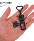 Heavy Duty Adjustable Toggle Latch Clamp With Quick Release Metal Pull Latch in black, shown on an open hand for size reference.