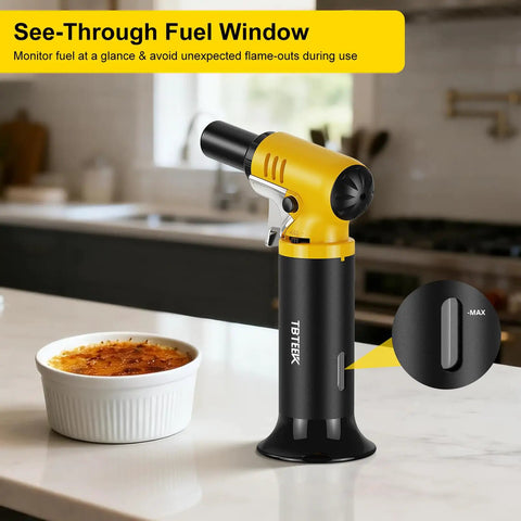 Slick Butane Torch With Clear Fuel Gauge And Adjustable Flame For Dead Simple One Hand Kitchen Cooking And Sick Flames Backyard Grilling Creme Brulee Finish Plus Craft Soldering Gear on kitchen counter.