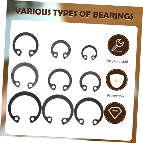 Assorted sizes of snap rings from 100 Piece Steel Snap Ring Set For Shafts And External Circlips displayed on a white background