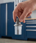 Four Adjustable Stainless Steel Furniture Feet With Levelers For Desks Cabinets Chairs And Shelving Units Bullet Leg Caps, hand holding one foot