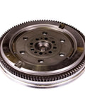 Factory Spec Dual Mass Clutch Flywheel Replacement Fits 2003 Through 2008 Hyundai Tiburon 2 Point 7 Liter V6 Engine side view showing metal construction and gear teeth.