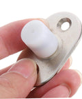 Close-up of Sliding Door Floor Guide Roller And Barn Door Stopper for Smooth Easy Install, showing durable nylon and iron material.