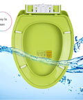 Slick Blue Elongated Toilet Seat Featuring Smooth Soft Close Lid And Quick Release Hinges Crafted From Tough Polypropylene That Snaps Right Onto Standard Bowls Resists Daily Wear And Stays Looking Sharp All Year Long, showing smooth green toilet seat with easy clean feature.