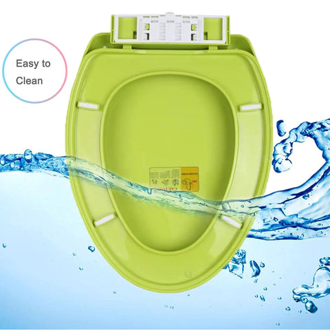 Slick Blue Elongated Toilet Seat Featuring Smooth Soft Close Lid And Quick Release Hinges Crafted From Tough Polypropylene That Snaps Right Onto Standard Bowls Resists Daily Wear And Stays Looking Sharp All Year Long, showing smooth green toilet seat with easy clean feature.