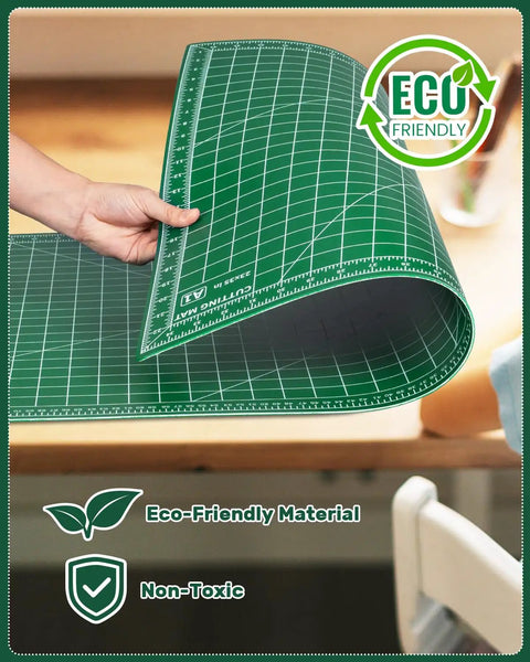 Person bending Self Healing Cutting Mat 23 By 35 Inches Large Double-Sided Rotary Cutting Mat For Sewing, Quilting, Scrapbooking, Fabric And Craft Projects With Clear Grid Lines, Angles And Guides, Green A1 with eco-friendly label.