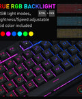 Close-up of Dope Full Size Gaming Keyboard With Quick Turn Volume Knob, 104 Keys Wired PC Peripheral Featuring Fresh RGB Lighting.