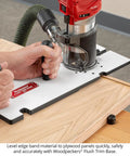 Hands using a Heavy Duty Flush Trim Router Base Plate with phenolic surface for edge banding on plywood.