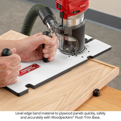 Hands using a Heavy Duty Flush Trim Router Base Plate with phenolic surface for edge banding on plywood.