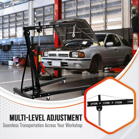 Heavy Hitter Foldable Hydraulic Engine Hoist Cherry Picker 4400 Lbs Capacity in workshop lifting engine with multi-level adjustment.