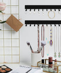 14 Inch Wall Key Holder With 10 Hooks Two Sets Metal Key Rack Wall Mount organizer in black with accessories hung on hooks.
