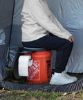 Total Game Changer Camp Toilet Seat With Ultra Plush Cushion And Secure Swivel Lid Fits Standard 5 Gallon Bucket used in tent.