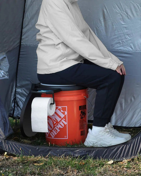 Total Game Changer Camp Toilet Seat With Ultra Plush Cushion And Secure Swivel Lid Fits Standard 5 Gallon Bucket used in tent.