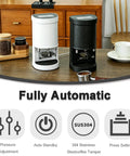 Automatic Coffee Tamper Machine With Constant Pressure And Adjustable Timing For Perfect Espresso Shots in white and black colors on a wooden counter.