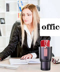 Woman at office desk using Sweet Ride Dash Cup Warmer And Chiller With Responsive Touchpad And Sharp LED Display.