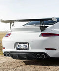 Rear view of car with Leopard Print License Plate Frame Two Pack Aluminum Car Tag Frames With Screws Caps