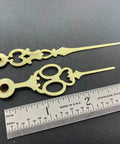 Brass Clock Hands Replacement Kit For 7 Inch Dial NOS DIY Clock Assembly with ruler for scale on black background