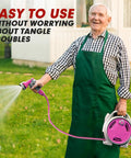 Man using Portable Hose Reel For Outdoor Use, 50Ft Garden Hose Reel With Six Pattern Spray Nozzle, Lightweight, Pink