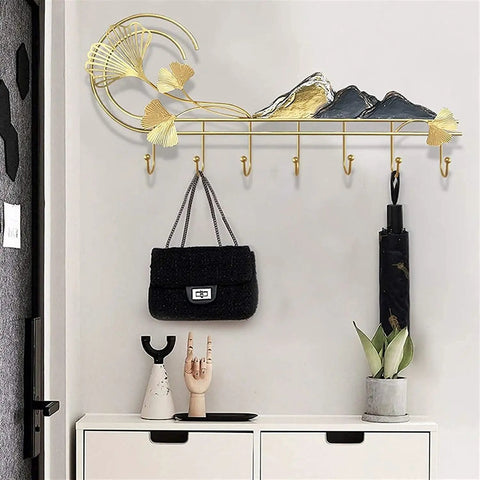 Slick Wall Mounted Coat Rack And Heavy Duty Entryway Hooks For Tiny Quarters Nordic Style, gold with mountain design, hooks for bags.
