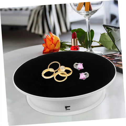 Premium Rotating Jewelry Display Stand With Smooth Electric Turntable Spin For Selling Accessories And Cosmetics, displaying rings.