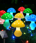 Dope Multicolor Solar Powered Mushroom Garden Lights With 50 LEDs, 23ft Outdoor Fairy String Lights in various colors at night.