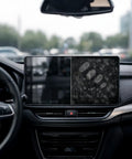 Car dashboard with split-screen showing clean and fingerprint-marked sides using 2 Pack Car And Device Screen Cleaner Spray And Wipe 2 In 1 Touchscreen Mist Cleaner For iPhone iPad Laptop MacBook And More With Microfiber Cloth Streak Free Fingerprint Remover Grey And Rose Gold.