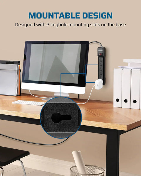 Two Pack 6 Outlet Power Strip Surge Protector With Six Foot Extension Cord, UL Listed, wall-mounted on desk, close-up of keyhole slot