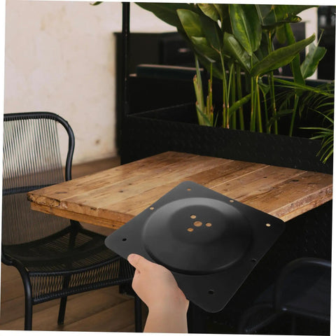 No Sweat Heavy Duty Table Leg Connectors With Adjustable Mounting Plates for fixing wobbly dining tables, shown in hand.
