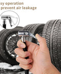 Tough 24cm Tire Inflator Hose with Two Locked-In Air Chucks for Schrader Valves nylon wrapped rubber hose held near a tire.