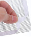 1 Set Window And Door Screen Repair Patch Kit With Adhesive Patches Easy To Use Durable Cover Pads For Quick Screen Fixes Ideal For Holes Tears And Punctures On Home Windows And Doors, showing hand applying adhesive patch to screen