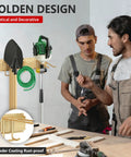 Two men discussing near a 33 Inch Wall Mounted Garage Tool Rack With 2 Panels And 6 Heavy Duty Hooks 675 Lb Capacity Adjustable Rails For Shovels And Yard Tools Durable Shed Organizer In Gold Finish