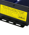 Close-up of electric bike controller for brushless motor with yellow label showing voltage and current specifications