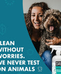 Woman smiling with dog next to cruelty-free label and Tea Tree Bathroom Cleaner Spray For Glass And Tile, 32oz bottle displayed.