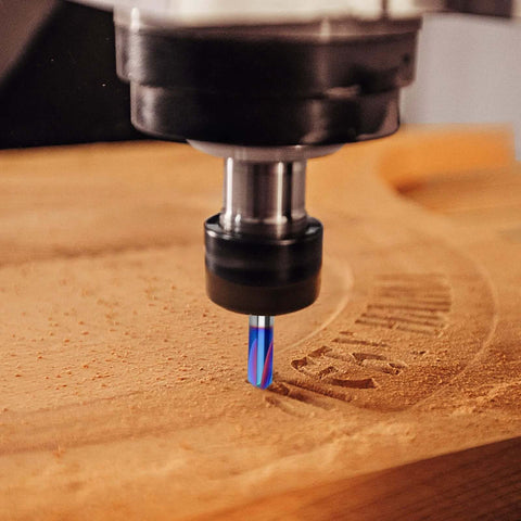 4-flute 90-degree V-groove carbide router bit with blue coating, 1/4 inch shank, cutting wood