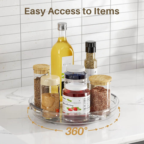 Smooth As Butter 4 Pack Lazy Susan Turntables with oils, spices, and jars on a clear, rotating tray in a kitchen setting.