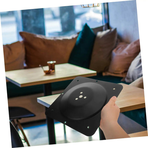 Heavy Duty Badass Table Leg Mounting Plate Multi Purpose Furniture Attachment Hardware No Sweat Install Iron Bracket Connector for Wobbly Leg Repair DIY Projects and Couch Support Gear held in hand.