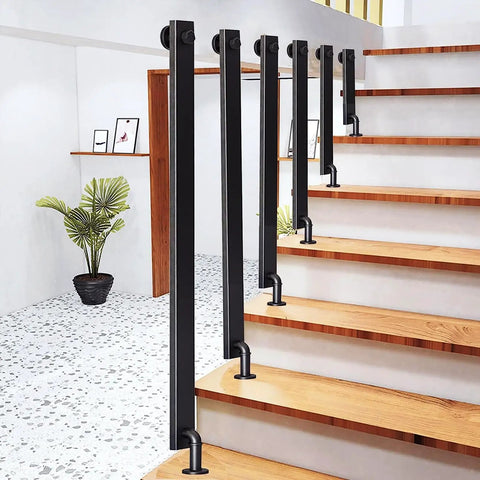 Rock Solid Matte Black Wrought Iron Handrail Adjustable Wall Mounted Stair Railing With Hella Grippy Nonslip Grip and Dang Easy Side Mount Brackets For A Badass Secure Way Upstairs, visible in a hallway with wood stairs.
