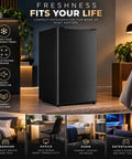 Kickin Compact 3.2 Cubic Foot Upright Freezer Solid Black Design in living space with plants and lighting.
