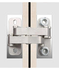 Heavy Duty Rugged Concealed Door Hinges For Stone And Marble Entries mounted on thick door frame with secure bolts.