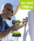 Man using 21V Cordless Impact Driver Kit With Brushless Motor One Quarter Inch Hex 230 Nm Torque 3300 RPM Includes Twenty Screwdriver Bits And Two Amp Hour Battery Variable Speed For DIY Automotive Work And Heavy Duty Fastening on wall