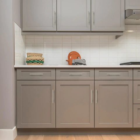 Modern kitchen with 50 Pack 5 Inch Brushed Nickel Cabinet Pulls Stainless Steel Kitchen Drawer Handles With 3 Inch Center To Center Spacing And Included Mounting Template For Quick No Nonsense Install on grey cabinets.