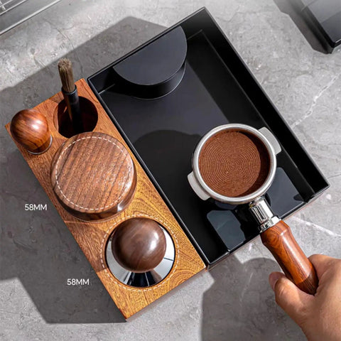 Hella Durable Premium Sapele Wood Espresso Tamper Station Featuring A Slick Built In Slide For Your 58mm Portafilter And A Killer Coffee Bar Accessory Organizer You Love. Image shows the tamper station with 58mm portafilter and accessories.