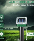 Solar Powered Ground Vibrating Pest Repellent For Gardens Lawns Yards Farms And Orchards Keeps Rats Snakes Rabbits Hedgehogs Outta Your Lawn With Ultrasonic Burrow Deterrence Every 30 Seconds showing waterproof design in rainy field