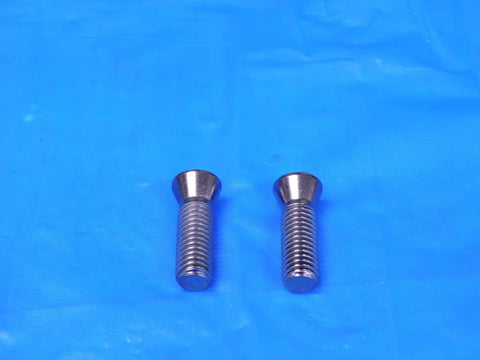 Shop Ready 2 Piece Torx Screw Hardware Set Featuring Tough TA Spade Drill Holder And Solid Mounting Brackets For Job Site Repairs And Weekend Warrior Builds - close-up of two Torx screws on a blue background.