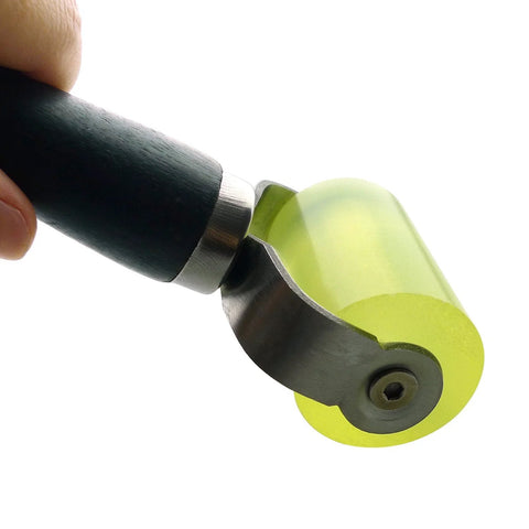 Car sound-deadener roller with yellow-green 2-inch wheel and black handle