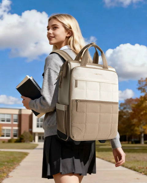 Rolling puffer backpack for women with wheels, two-tone beige and taupe quilted exterior, luggage-style laptop bag.
